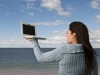 Woman Holding Laptop Computer